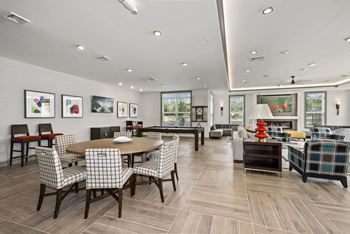 Clubhouse with fireplace, flat screen tvs, free wi-fi, kitchen and coffee/juice bar